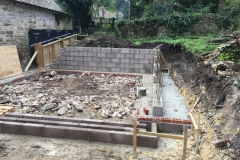 Side extension with retaining wall and underpinning, Dorchester